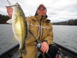 Gussy with a nice spotted bass caught on a Jackall Squad Minnow 115 jerkbait in practice. 